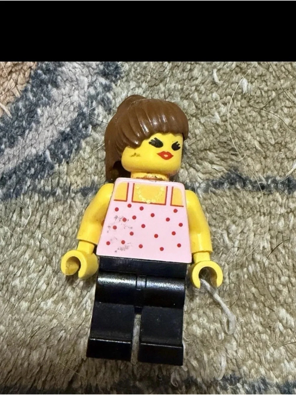 Lego Yellow Minifigure with Pink Polka Dot Top and Black Legs